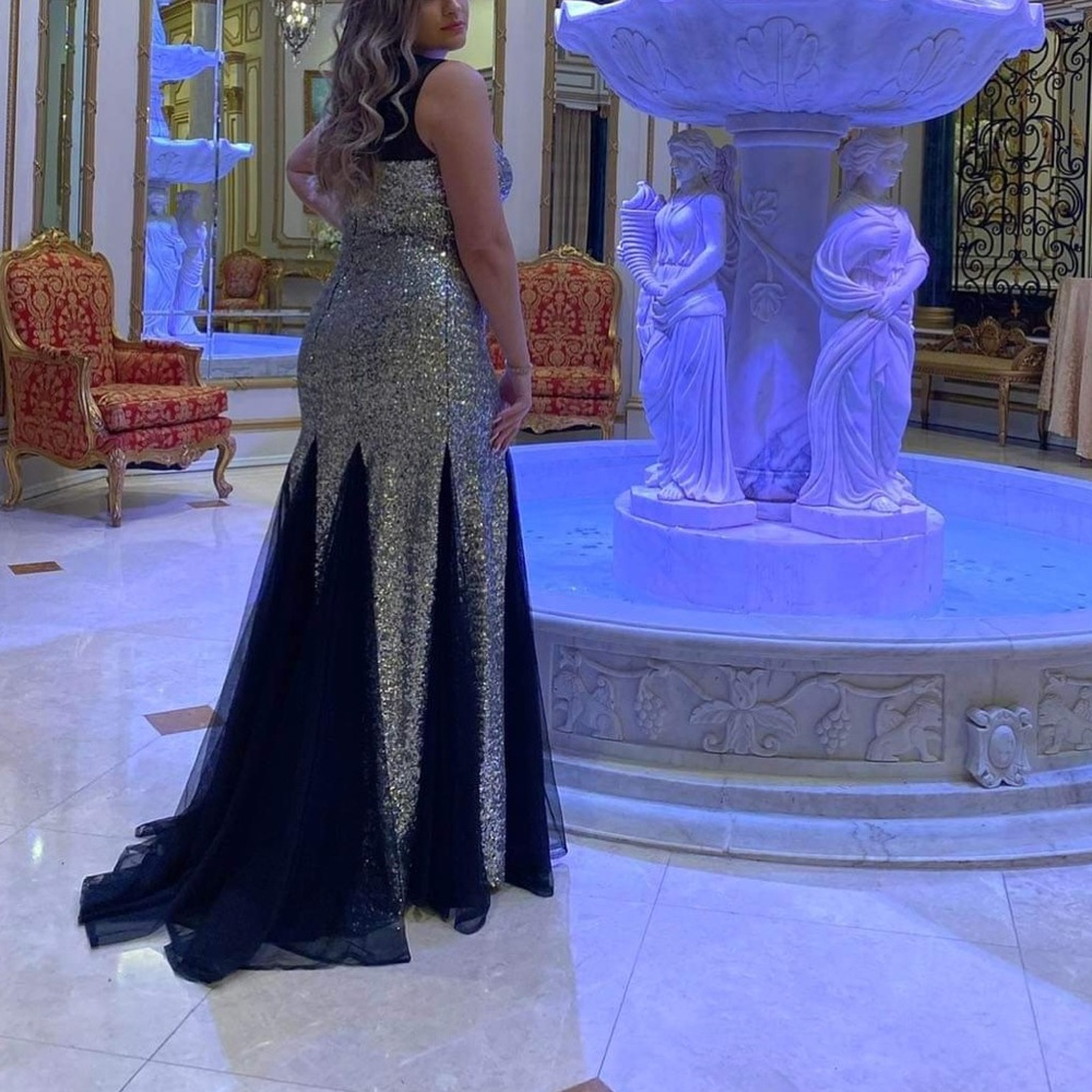 Selling custom made dress, worn for two hours . Size large ! With mini train
